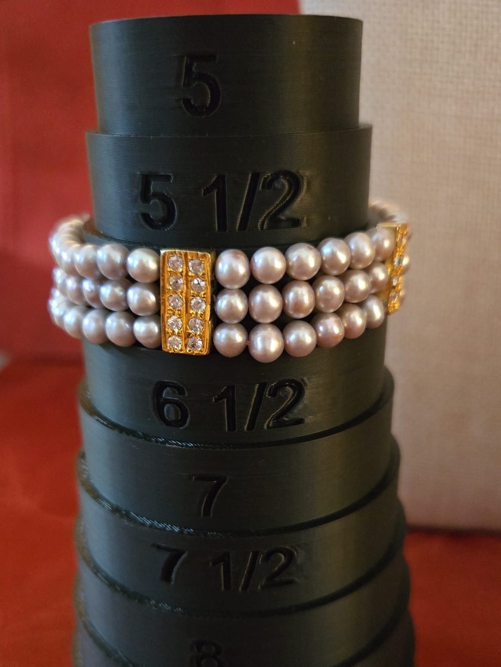 Triple-Row Pearl Bracelet with Gold Crystal Accents
